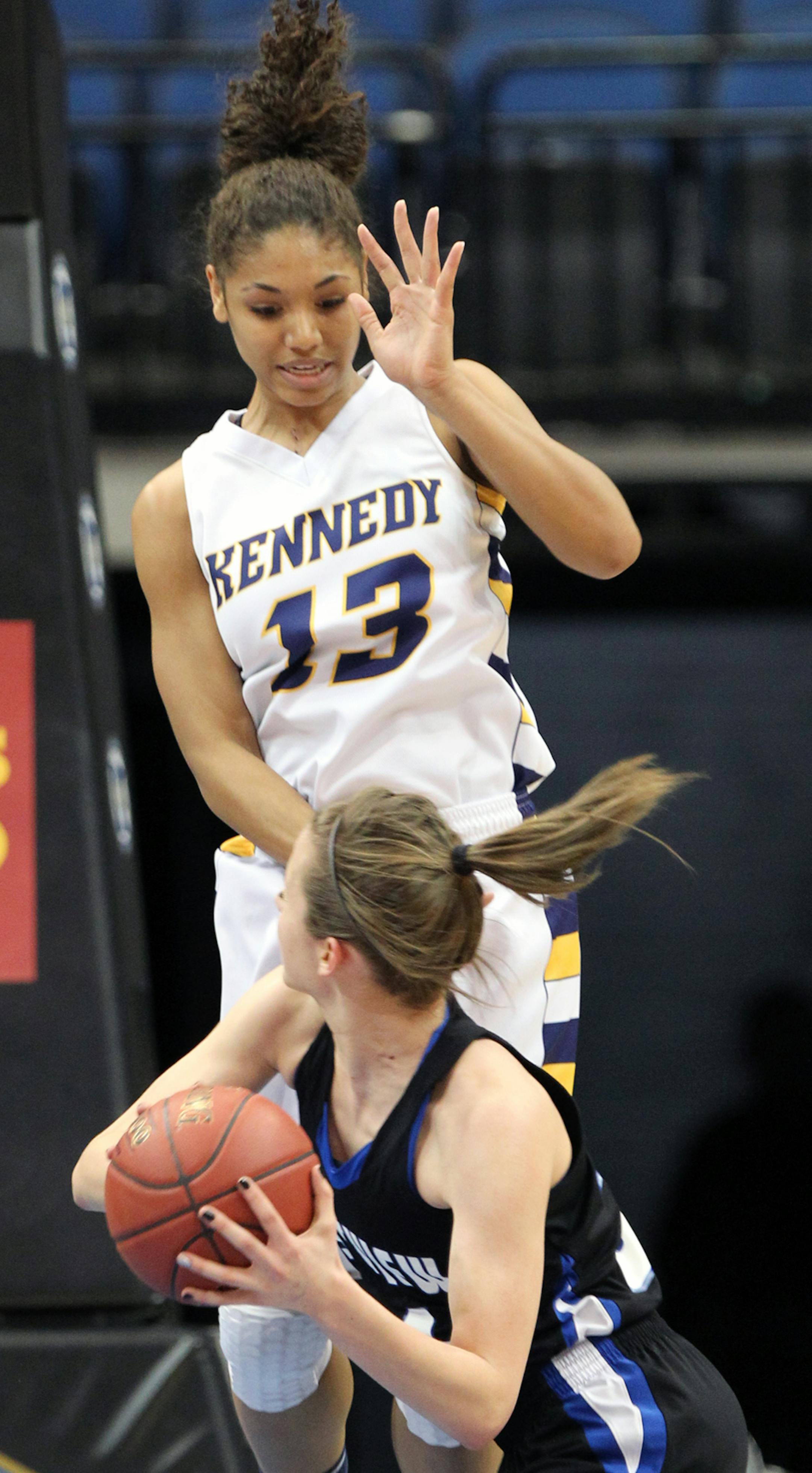 GIRLS BASKETBALL STATE SEMIFINALS Class 4A - Bloomington Kennedy vs. Eastview. Eastview's Hana Metoxen faked Kennedy's Jade Martin (13) into the air before driving to the basket. (MARLIN LEVISON/STARTRIBUNE(mlevison@startribune.com (cq -PROGRAM)