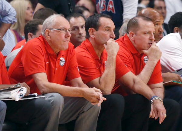 Wolves coach Tom Thibodeau, right, was an assistant to head coach Mike Krzyzewski, center, for the U.S. National basketball team.