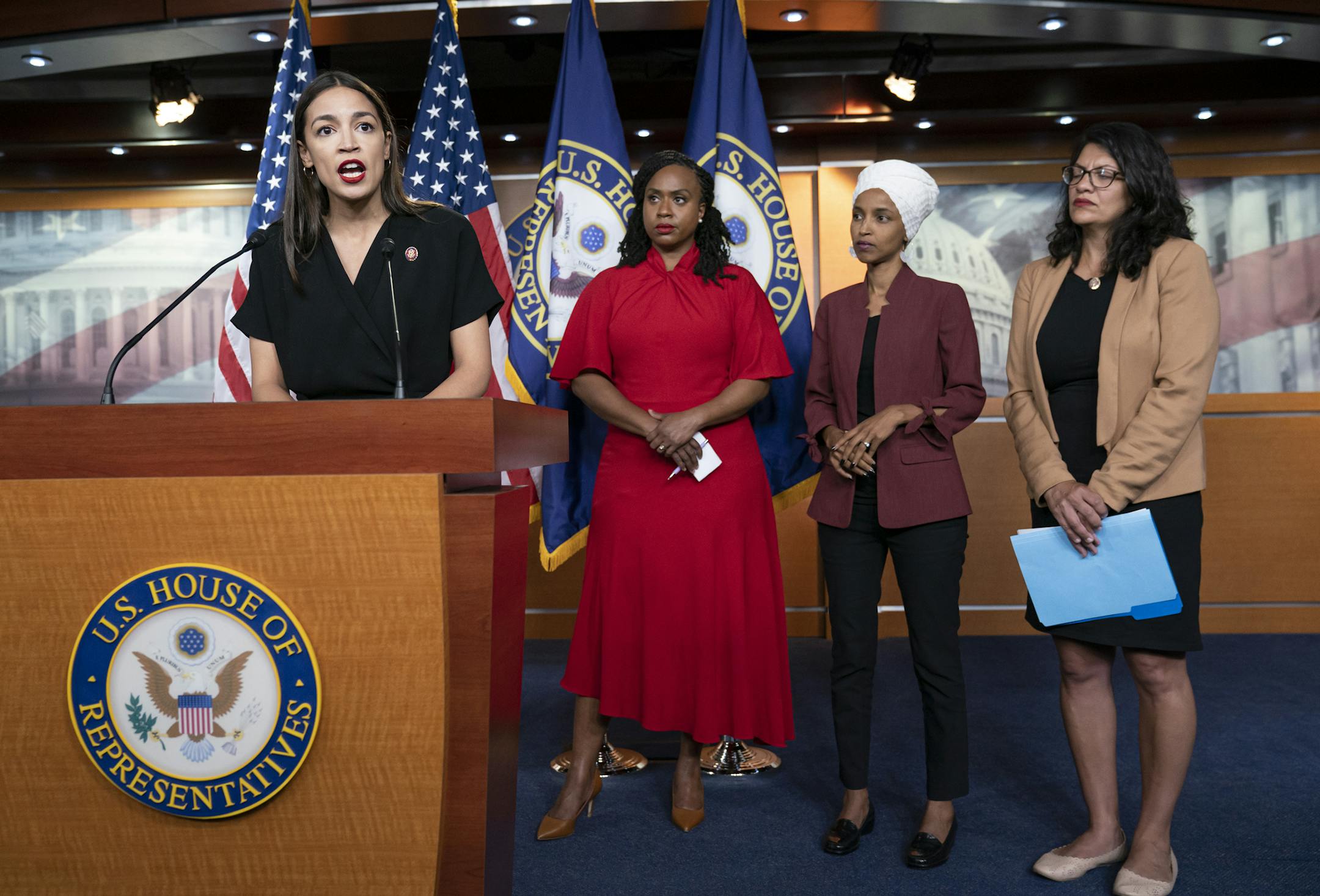 From left, Rep. Alexandria Ocasio-Cortez, D-N.Y., Rep. Ayanna Pressley, D-Mass., Rep. llhan Omar, D-Minn., and Rep. Rashida Tlaib, D-Mich., respond to remarks by President Donald Trump after his call for the four Democratic congresswomen to go back to their "broken" countries, during a news conference at the Capitol in Washington, Monday, July 15, 2019. All are American citizens and three of the four were born in the U.S. (AP Photo/J. Scott Applewhite)