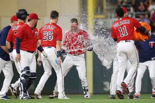 Twins shortstop Jorge Polanco threw water on teammate Mitch Garver after Garver's walkoff double beat the Indians earlier this season.
