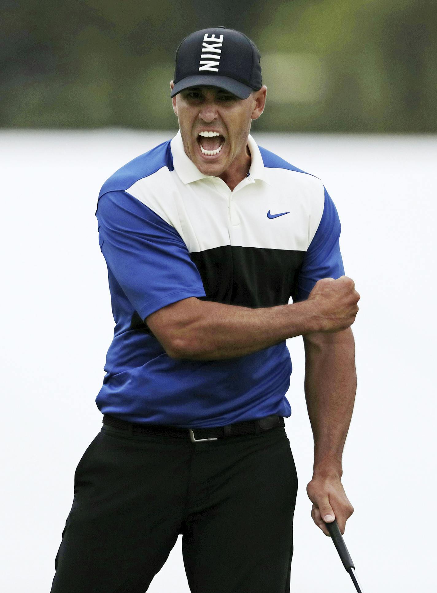 Brooks Koepka reacts after sinking a putt on the 18th green to win the PGA Championship golf tournament, Sunday, May 19, 2019, at Bethpage Black in Farmingdale, N.Y. (AP Photo/Charles Krupa)