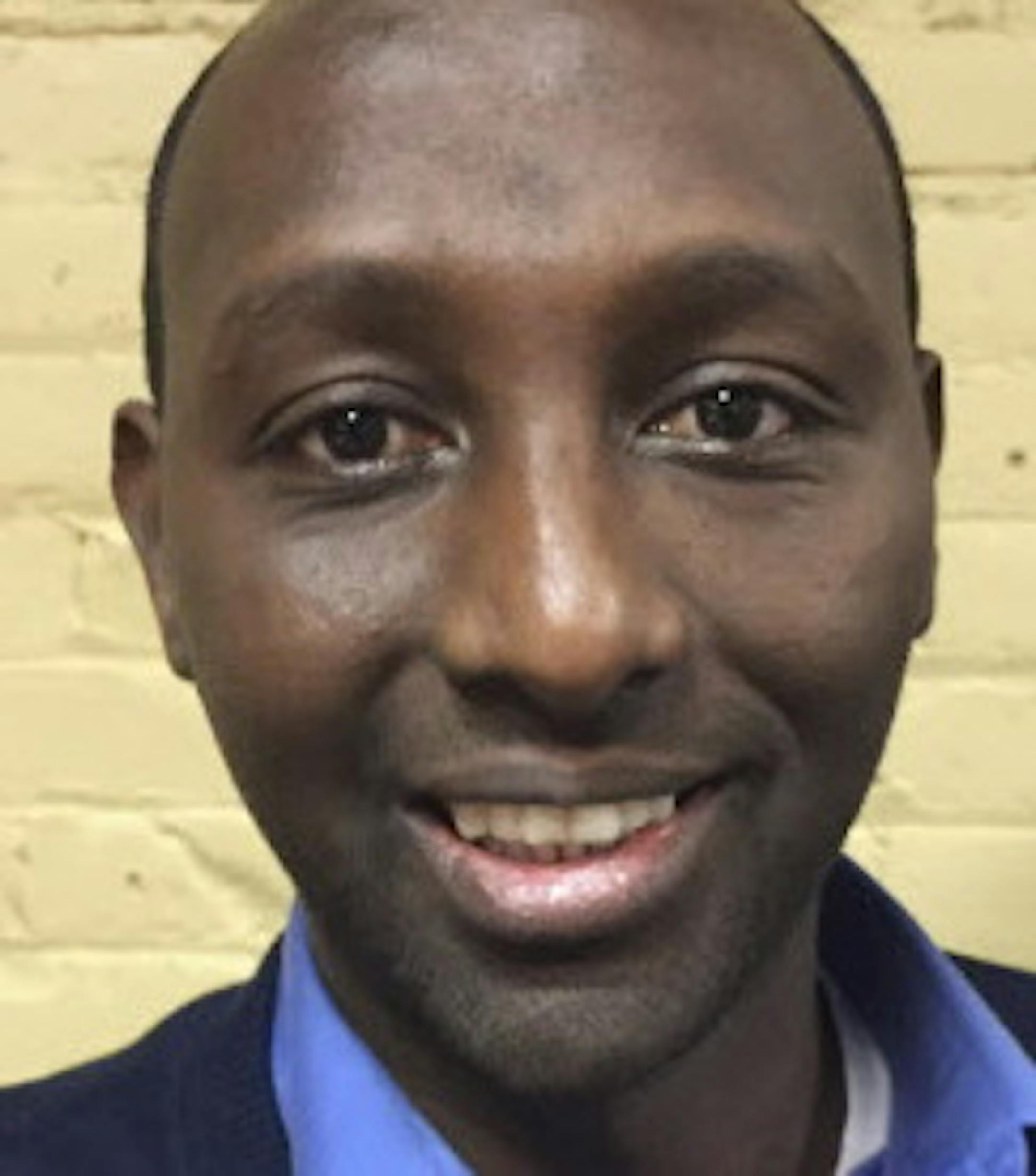 In this Dec. 20, 2016 photo, Mohamud Noor, executive director of the Confederation of Somali Community in Minnesota, poses for a photo at an employment center in Minneapolis' largest Somali neighborhood. Noor's organization created the center with grant money as part of a federal pilot project designed to combat terror recruitment by creating positive opportunities for youth. (AP Photo/Amy Forliti)