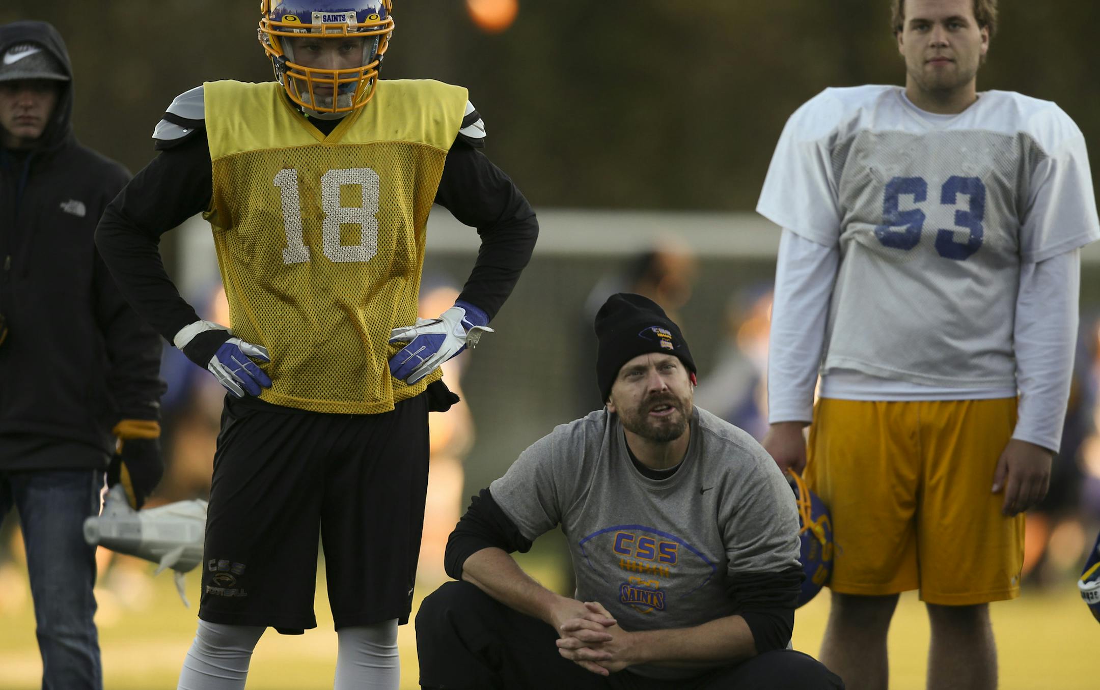 St. Scholastica head football coach Kurt Ramler watched his team run a play during practice last month.