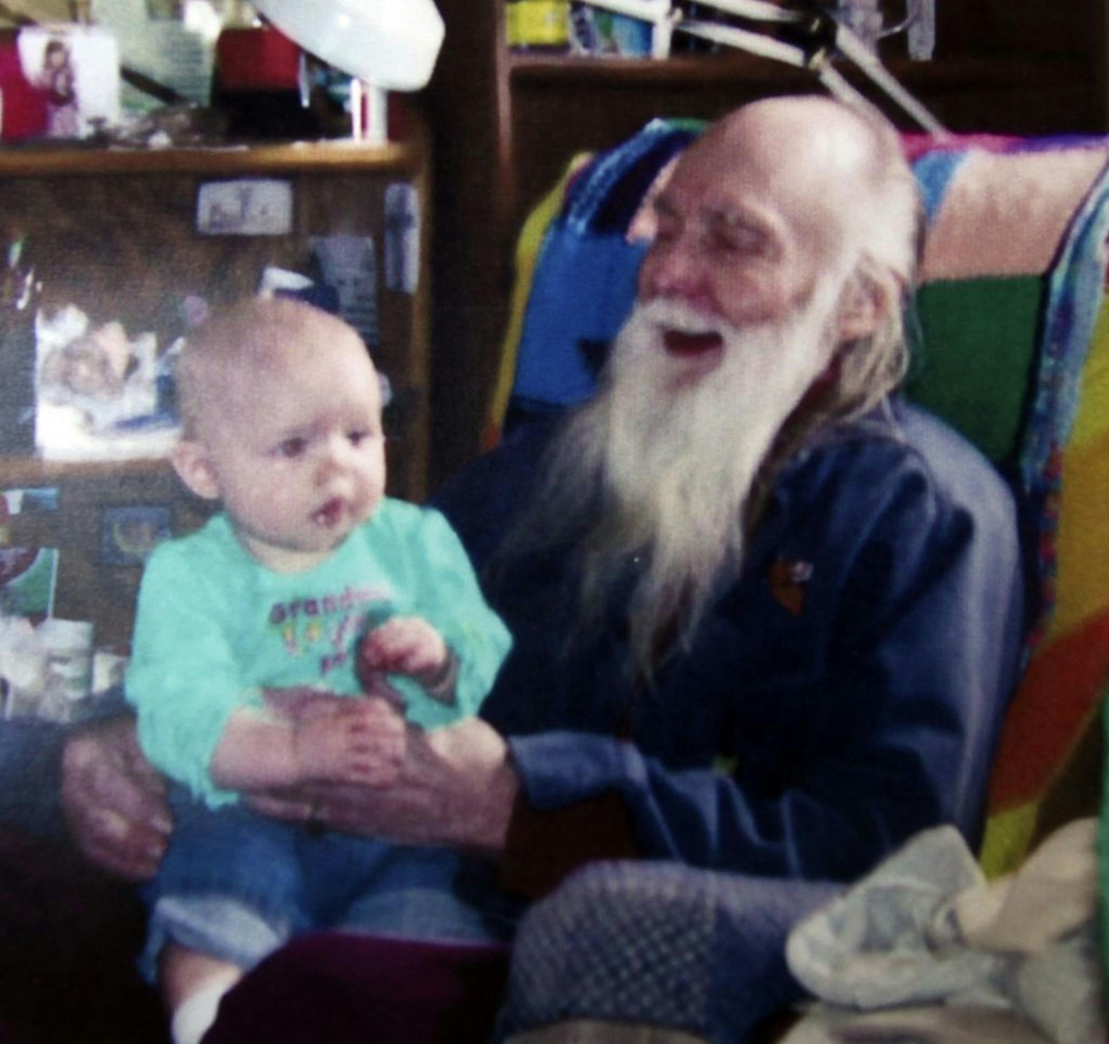 A picture of Roger Tetu with his great grand daughter Jessica that was taken about three months ago. The copy was made at his home in St. Paul, Minn., Wednesday, July 27, 2011. Tetu was killed in an hit and run not ran from his home.