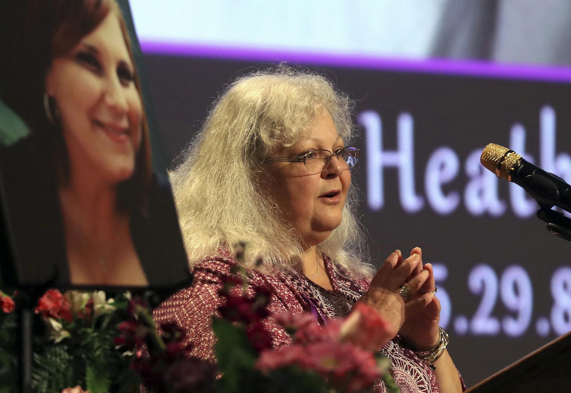 Susan Bro, mother to Heather Heyer, speaks during a memorial for her daughter, Wednesday, Aug. 16, 2017, at the Paramount Theater in Charlottesville, Va. Heyer was killed Saturday, when a car rammed into a crowd of people protesting a white nationalist rally. (Andrew Shurtleff/The Daily Progress via AP, Pool)