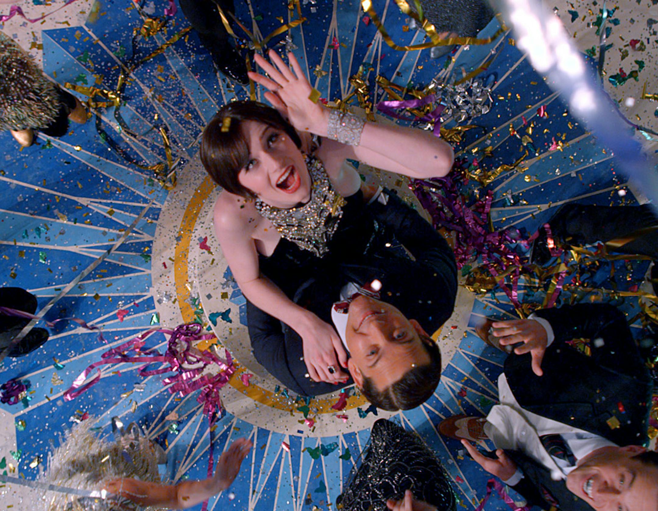 (L-r) ELIZABETH DEBICKI as Jordan Baker and TOBEY MAGUIRE as Nick Carraway in Warner Bros. Pictures‚Äô and Village Roadshow Pictures‚Äô drama ‚ÄúTHE GREAT GATSBY,‚Äù a Warner Bros. Pictures release.