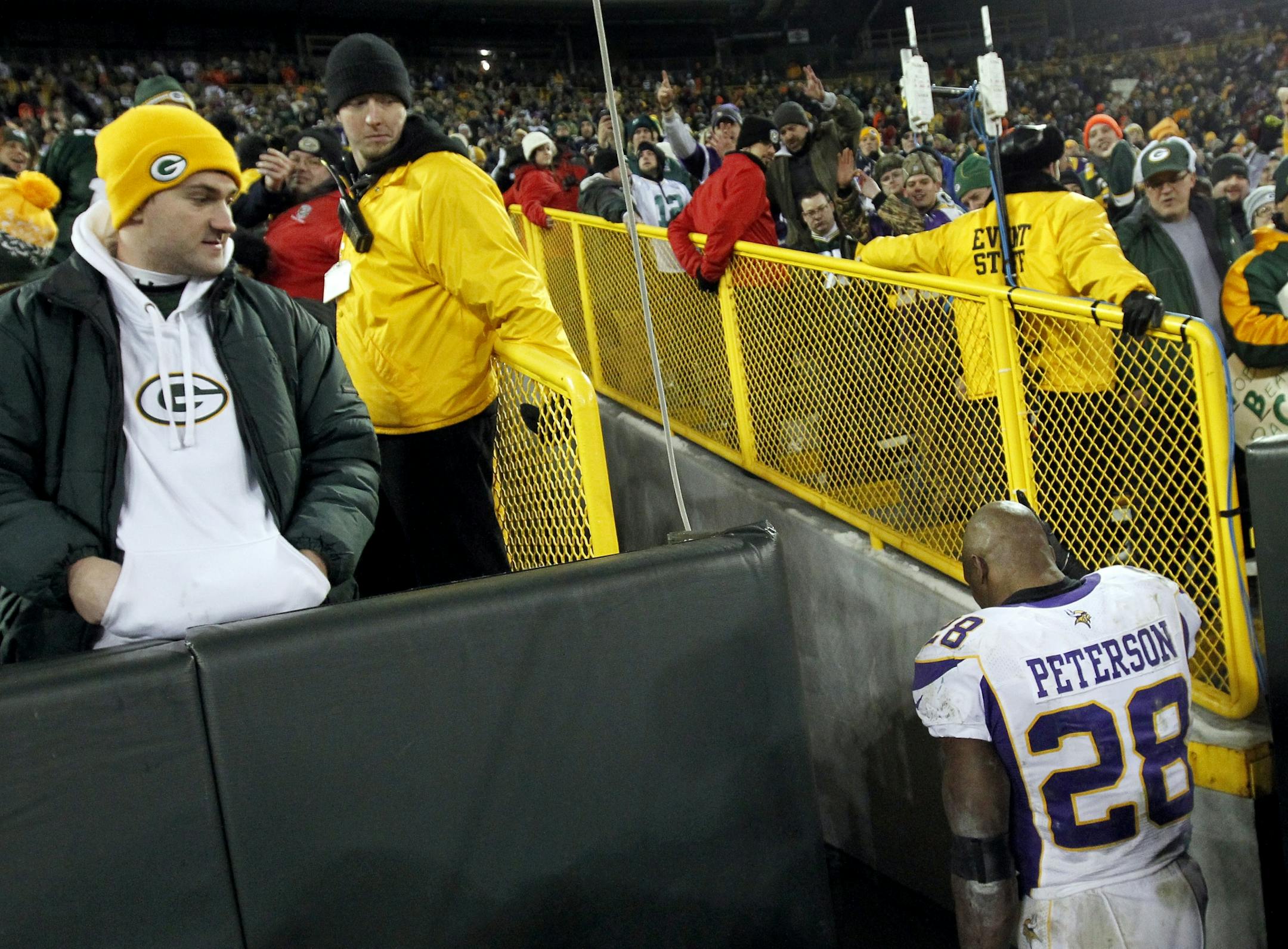 Vikings running back Adrian Peterson walked off the field after Green Bay beat Minnesota 24-10 in the playoffs.