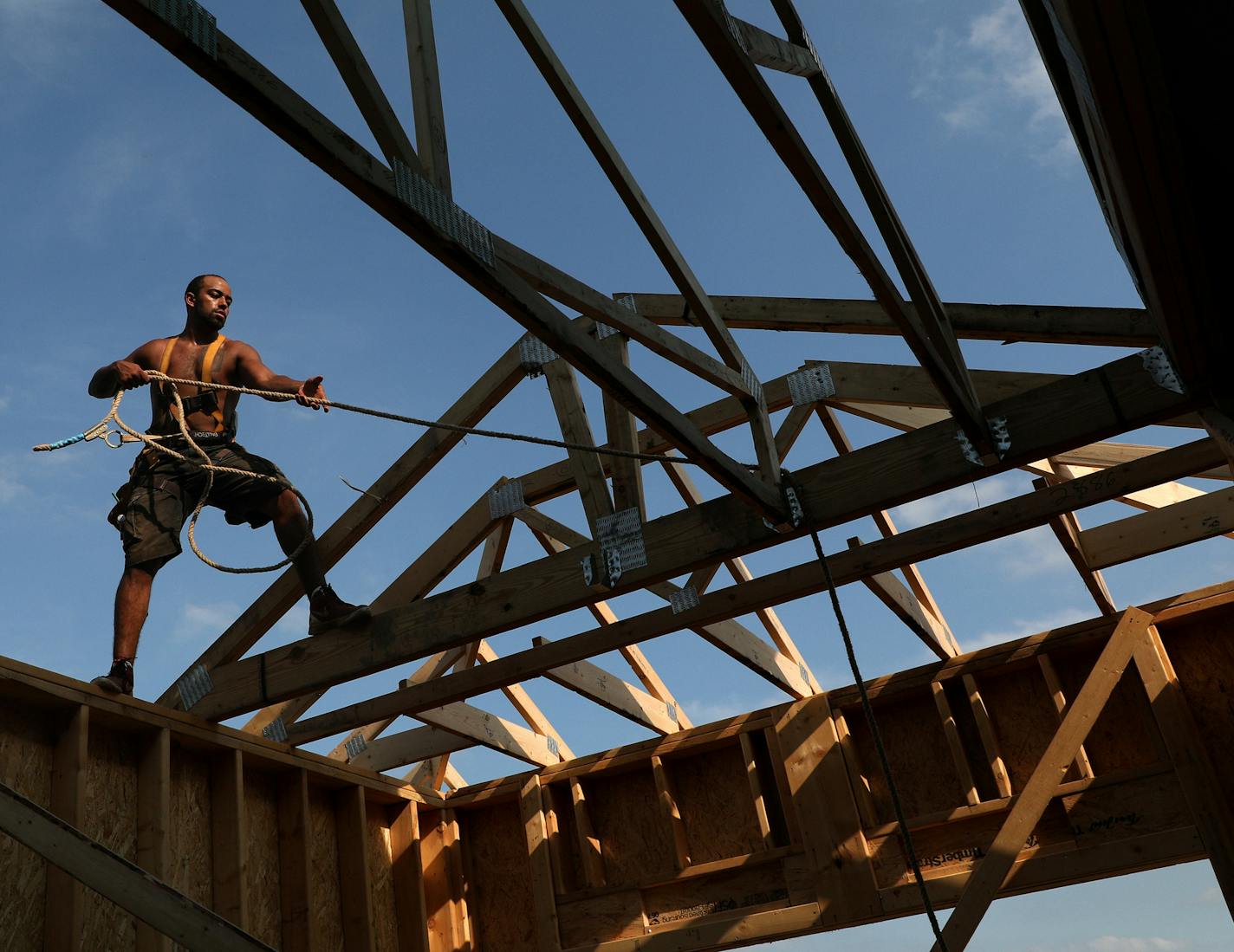 Carpenter Caleb Morrison worked to frame out a house in the Settler's Ridge development in Inver Grove Heights.