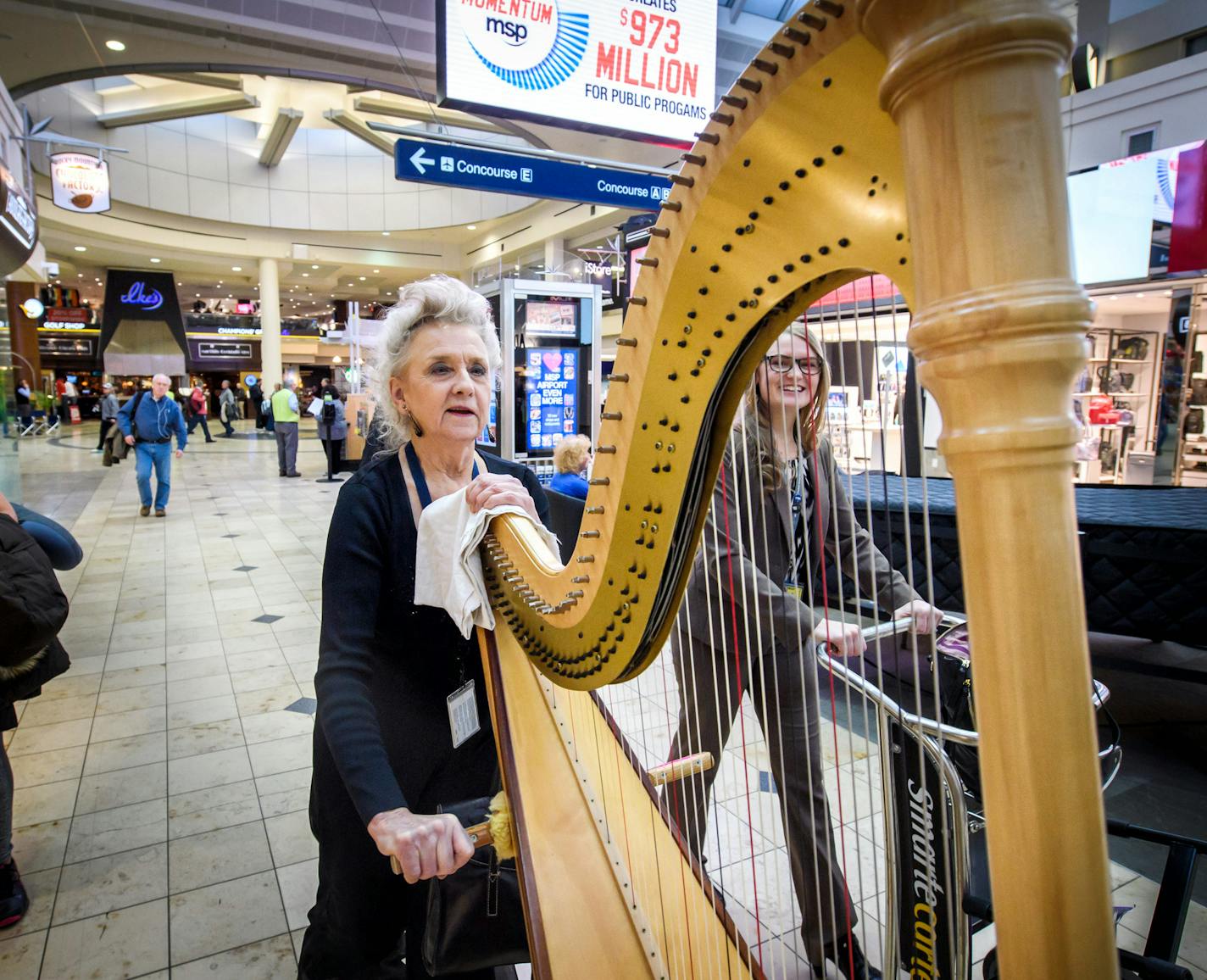 Pat Carlson plays harp music throughout MSP Airport through the MSP Airport Foundation. Here she moved her harp to a new location. ] GLEN STUBBE &#x2022; glen.stubbe@startribune.com Thursday, January 11, 2018 The Metropolitan Airports Commission operates MSP but it's a little-known foundation that is the force behind many of the details that make it pleasant. The nonprofit Airport Foundation oversees the Minnesota-centric arts exhibits including a new photo exhibit on Minnesota's Holocaust survi