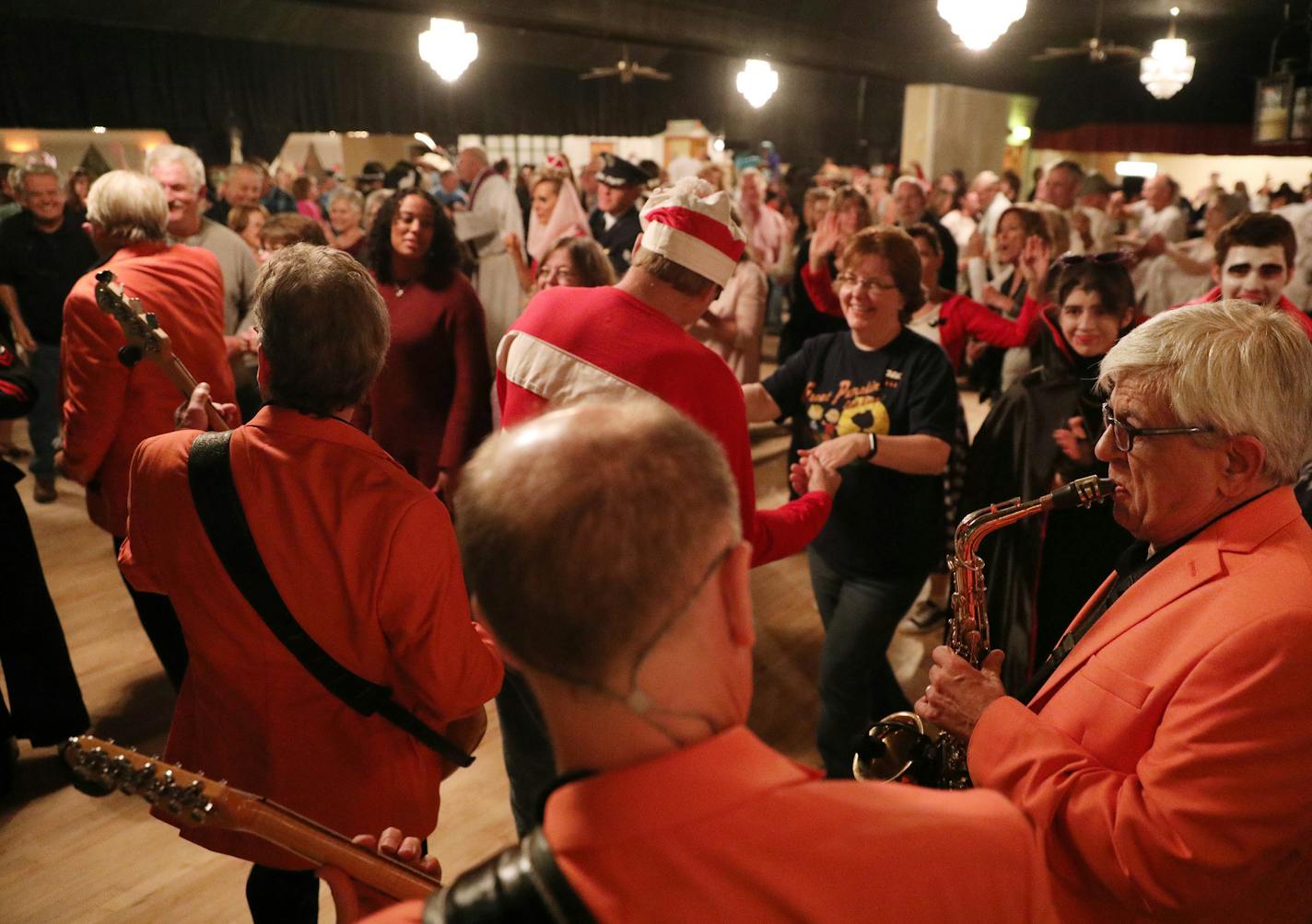 The Rockin' Hollywoods joined the crowd on the dance floor to play out a song. ] ANTHONY SOUFFLE &#xef; anthony.souffle@startribune.com The Withrow Ballroom, thought to be the state's oldest ballroom, held possibly their last dance Saturday, Oct. 28, 2017 in Hugo, Minn.