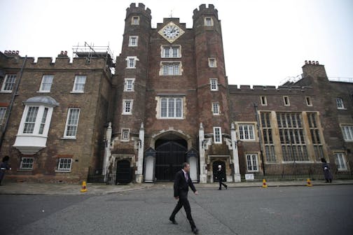 People walk past St. James Palace in central London, Monday, Nov. 14, 2011. Queen Elizabeth II has given her approval to renting out state apartments at St. James's Palace as party venues during the 2012 London Olympics. Buckingham Palace says holders of royal warrants _ companies with long-standing ties to the royal family _ will be given a chance to rent state apartments during the games, which begin on July 27 and last until Aug. 12.