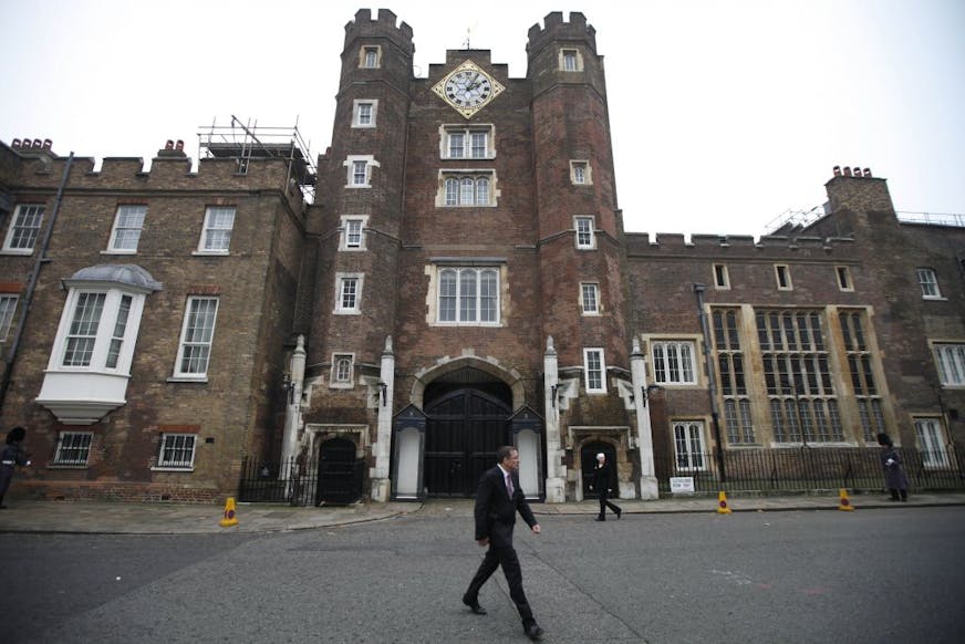 People walk past St. James Palace in central London, Monday, Nov. 14, 2011. Queen Elizabeth II has given her approval to renting out state apartments at St. James's Palace as party venues during the 2012 London Olympics. Buckingham Palace says holders of royal warrants _ companies with long-standing ties to the royal family _ will be given a chance to rent state apartments during the games, which begin on July 27 and last until Aug. 12.