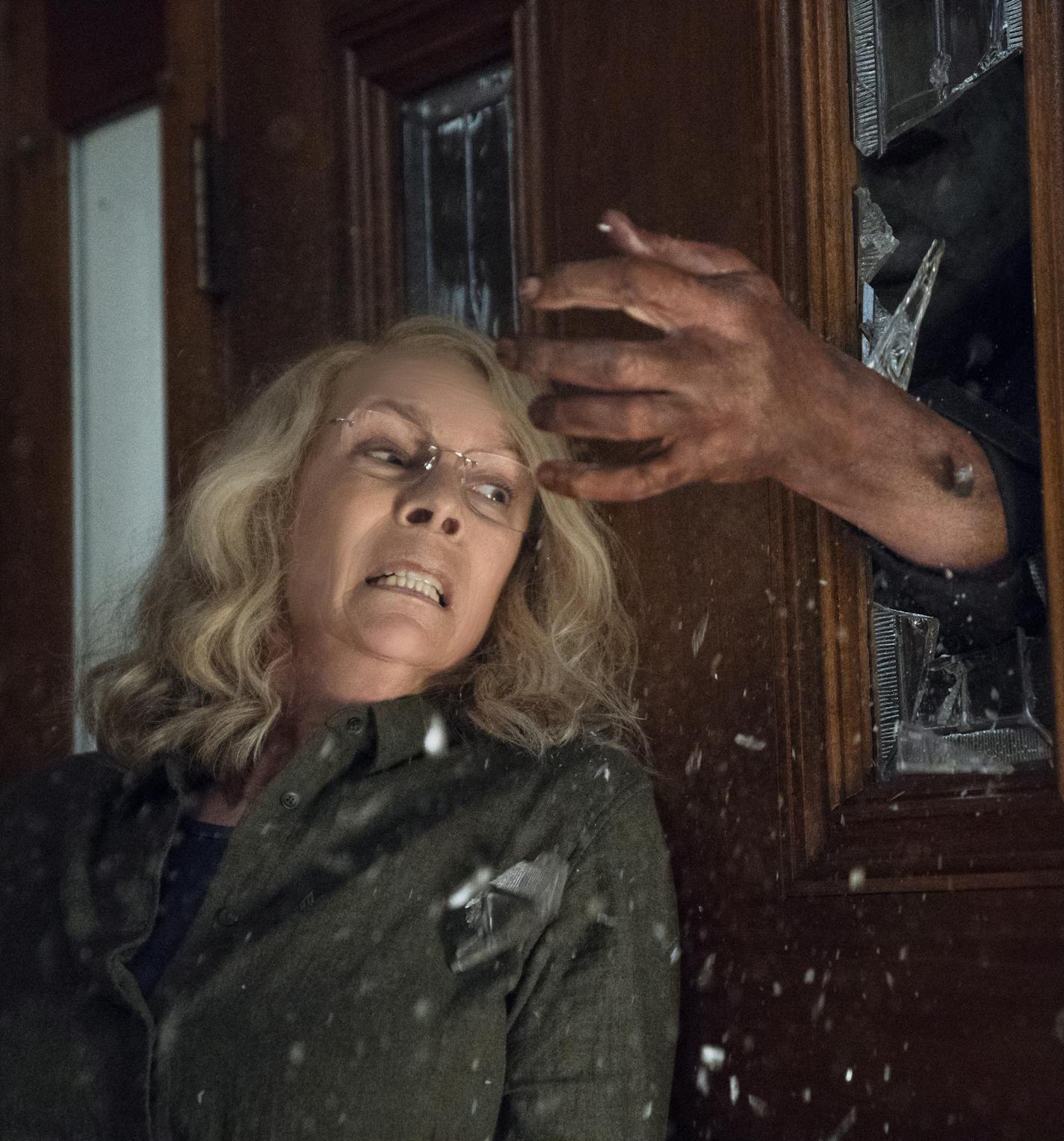 This image released by Universal Pictures shows Jamie Lee Curtis in a scene from "Halloween," in theaters nationwide on Oct. 19. (Ryan Green/Universal Pictures via AP)