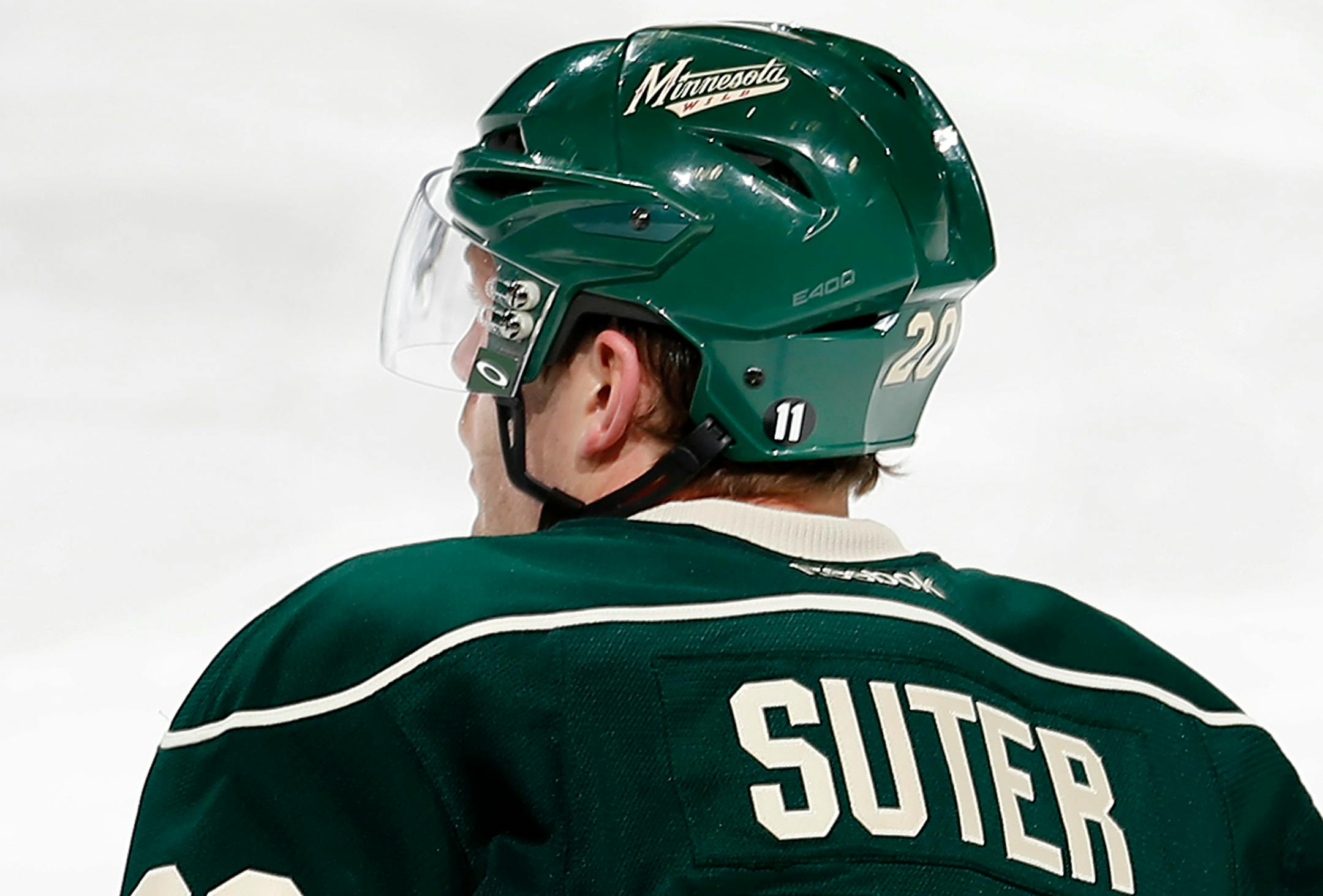 Minnesota Wild players including Ryan Suter (20) wore a number 11 on their helmets to honor J.P. Parise. ] CARLOS GONZALEZ cgonzalez@startribune.com, January 8, 2015, St. Paul, Minn., Xcel Energy Center, NHL, Minnesota Wild vs. Chicago Blackhawks