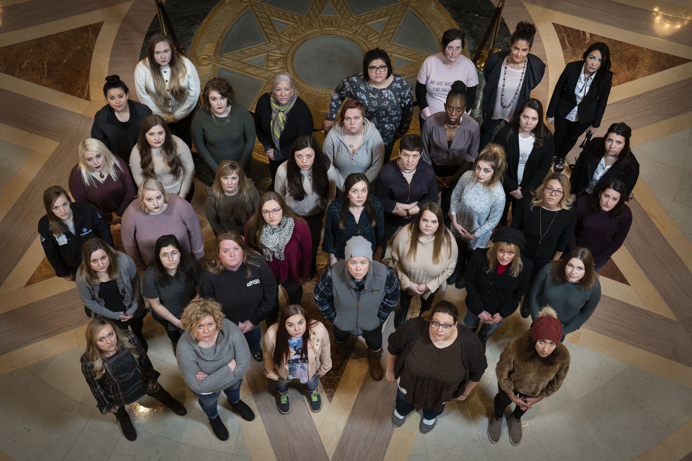 Group photo of participants in the Denied Justice series at the State Capitol in St. Paul, Minn., on December 22, 2018. ] RENEE JONES SCHNEIDER &#xa5; renee.jones@startribune.com