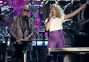 Stevie Wonder, left, and Tori Kelly, shown during a Prince tribute at the BET Awards in June, are among those performing at the Oct. 13 show in St. Pa