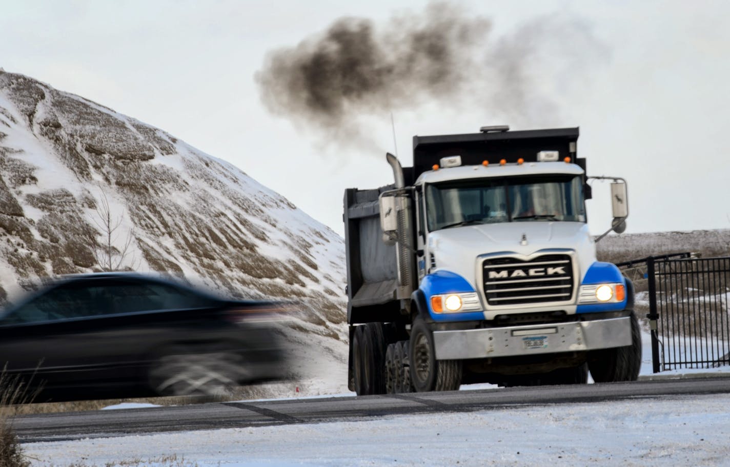 Truckers picked up loads of material from Dakota Aggregates, UMore Park Rosemount, Minnesota turning onto C.R. 46. ] GLEN STUBBE * gstubbe@startribune.com Monday, November 17, 2014 Truckers picked up loads of material from Dakota Aggregates, UMore Park Rosemount, Minnesota.