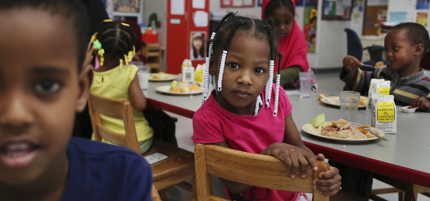 In Hennepin County, the Parents in Community Action (PICA) Head Start program will be forced to let up to 14 teachers go and kick 90 children out of classrooms for the 2014-15 school year if the sequester continues. Here, children 3 to 5 years old in a headstart classroom for children living in homeless shelters eat breakfast Thursday, June 13, 2013, in Minneapolis, MN.](DAVID JOLES/STARTRIBUNE) djoles@startribune.com In the months since the automatic federal budget cuts known as the sequester t