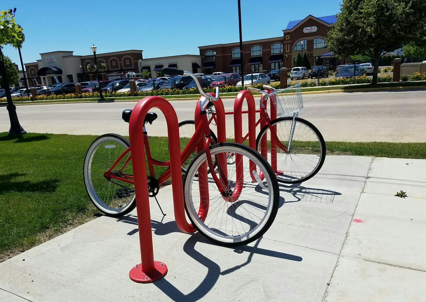 In Austin, Minn's. bike-sharing program, volunteers refurbish donated bikes, which are painted bright red and put into matching bike racks for anyone to use and return.