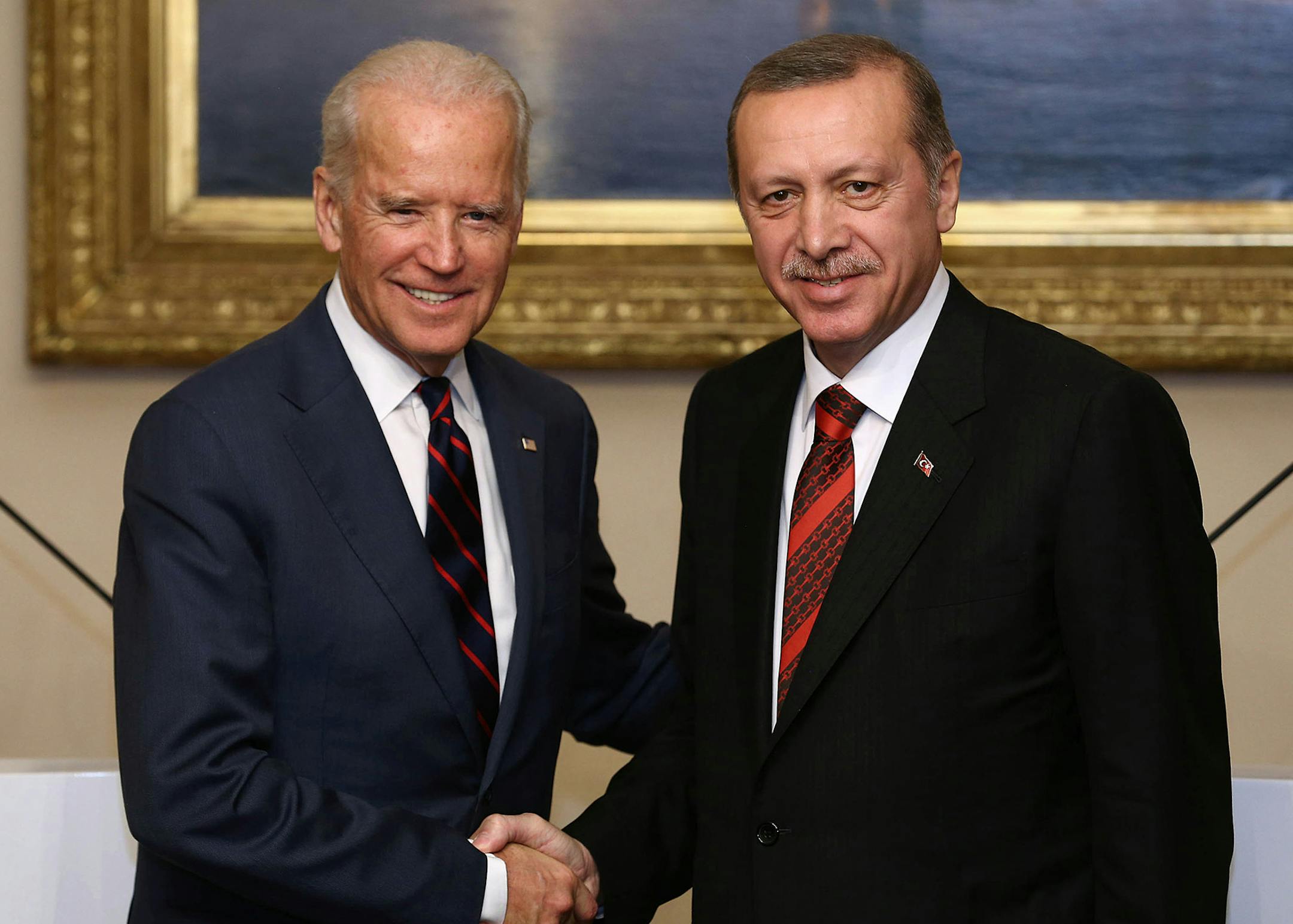 U.S. Vice President Joe Biden, left, and Turkish President Recep Tayyip Erdogan shake hands after a joint news conference in Istanbul, Turkey, Satuday, Nov. 22, 2014. Biden on Friday became the latest in a parade of U.S. officials trying to push Turkey to step up its role in the international coalition's fight against Islamic State extremists.(AP Photo/Emrah Gurel) ORG XMIT: MIN2014121116001059
