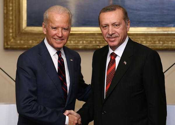 U.S. Vice President Joe Biden, left, and Turkish President Recep Tayyip Erdogan shake hands after a joint news conference in Istanbul, Turkey, Satuday