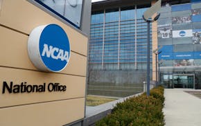 FILE - This is a March 12, 2020, file photo showing NCAA headquarters in Indianapolis. A lawsuit filed in West Virginia’s northern district challeng
