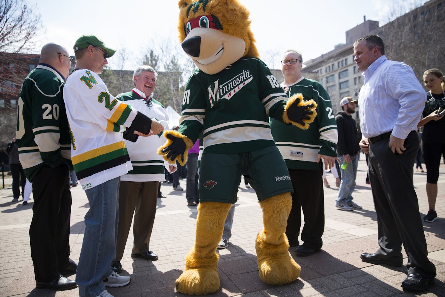 Nordy dances with Wild fans during a Minnesota Wild pep rally at Mears Park in downtown St. Paul.