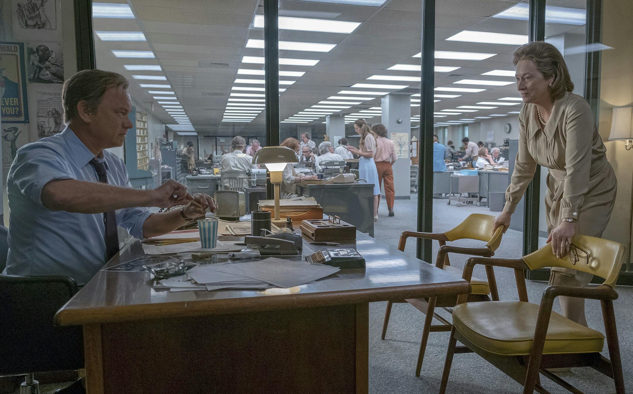 In this image released by 20th Century Fox, Tom Hanks portrays Ben Bradlee, left, and Meryl Streep portrays Katharine Graham in a scene from "The Post." The film was nominated for a Golden Globe award for best motion picture drama on Monday, Dec. 11, 2017. The 75th Golden Globe Awards will be held on Sunday, Jan. 7, 2018 on NBC. (Niko Tavernise/20th Century Fox via AP)