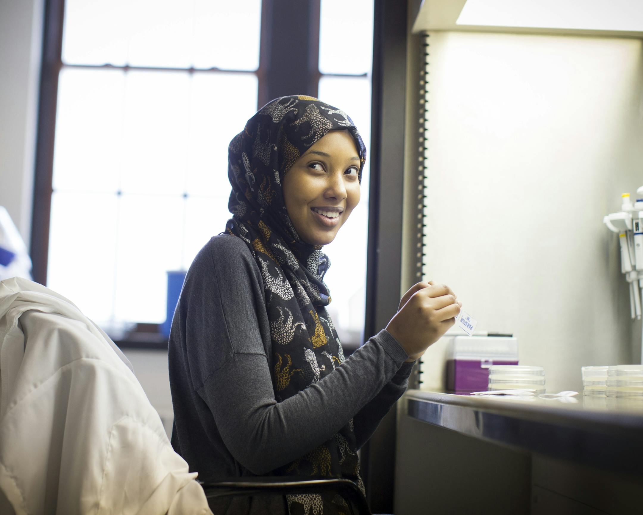 University of Minnesota student Kowsar Mohamed, 19, works part time and volunteers in this research lab at the U.