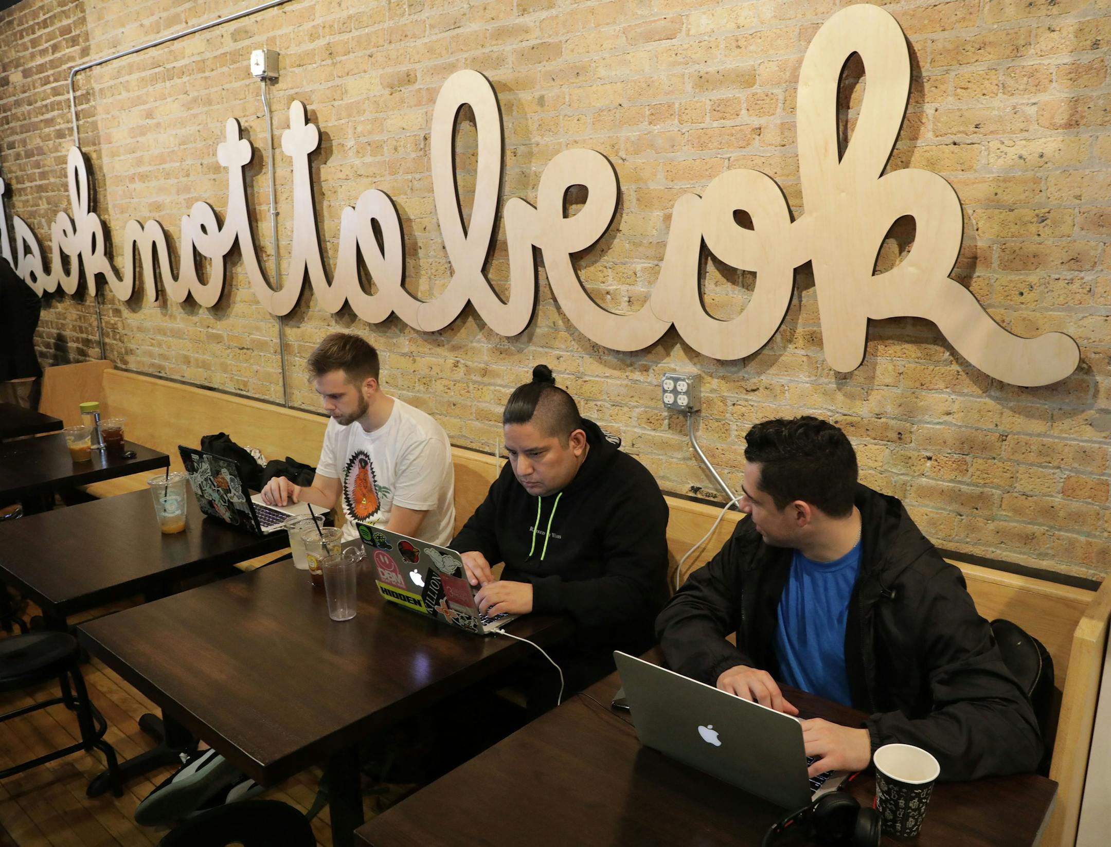 Patrons gather for the opening of the Sip of Hope Coffee Bar, in Chicago, Thursday, May 3, 2018. The coffee shop's aim is to help educate as many people as possible on the many issues of mental health. The staff are all certified in Mental Health first Aid, and the shop will have materials and contact information for other organizations that can help. (Antonio Perez/ Chicago Tribune/TNS)