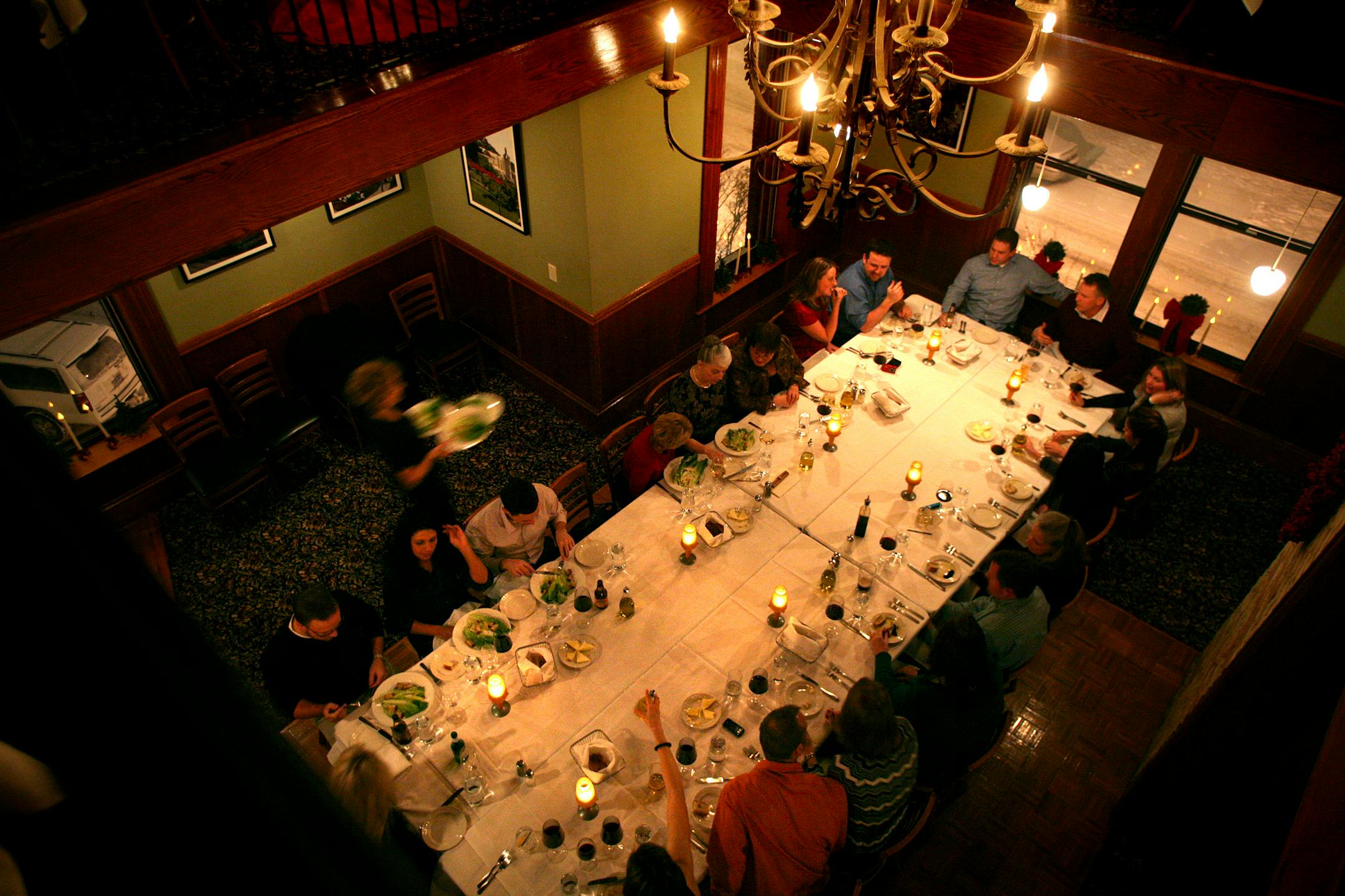 Birchwood Dental employees and their guests enjoyed drinks and a four-course dinner during the company's holiday party on the third floor of Il Vesco Vino. It was the group's second year holding their holiday party there because they had so much fun last year. But Henry Buffalo, manager of the St. Paul restaurant, said holiday-party revenue has dropped from $42,000 last year to about $25,000 this year.