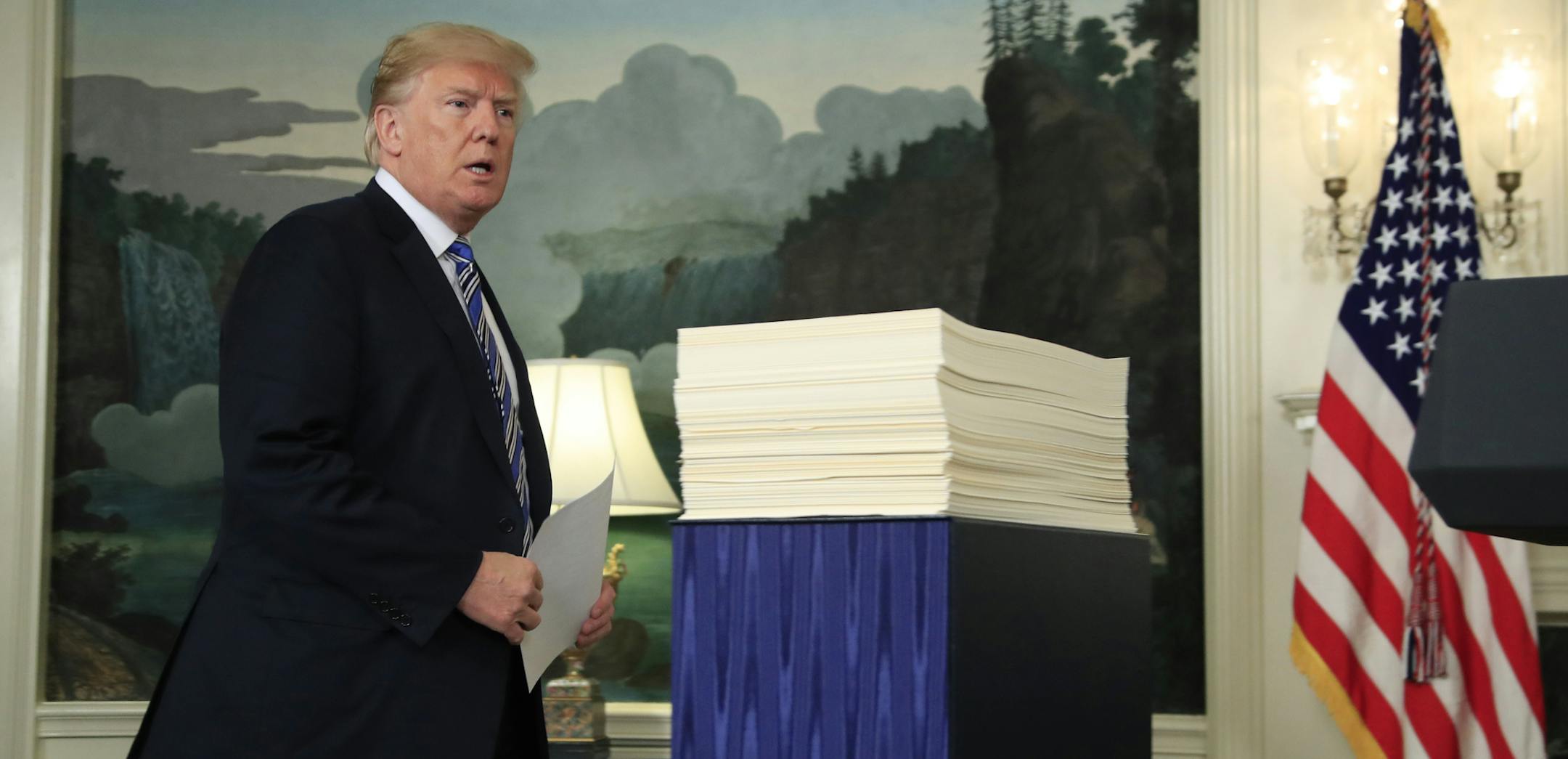 President Donald Trump arrives in the Diplomatic Room of the White House in Washington, Friday, March 23, 2018, to speak about the $1.3 trillion spending bill which he signed earlier in the day. (AP Photo/Manuel Balce Ceneta)