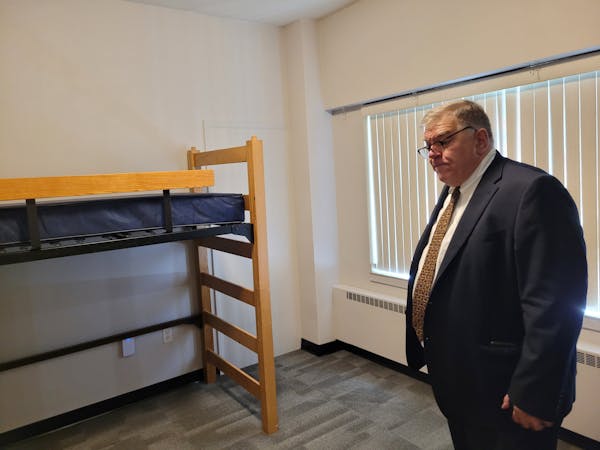 Jeff Allman, owner of the Residences of Old Town Hall in Rochester, showed an empty room at the low-income apartment building on Tuesday. Allman is se