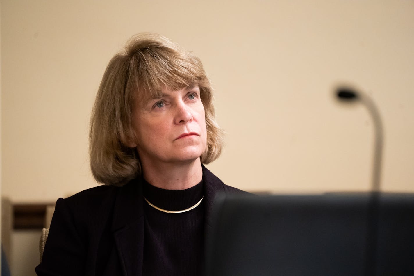 DHS Commissioner Jodi Harpstead listened as Legislative Auditor James Nobles discussed the results of his investigation into Medicaid overpayments by the state Department of Human Services (DHS) to Indian bands for opioid addiction treatment.