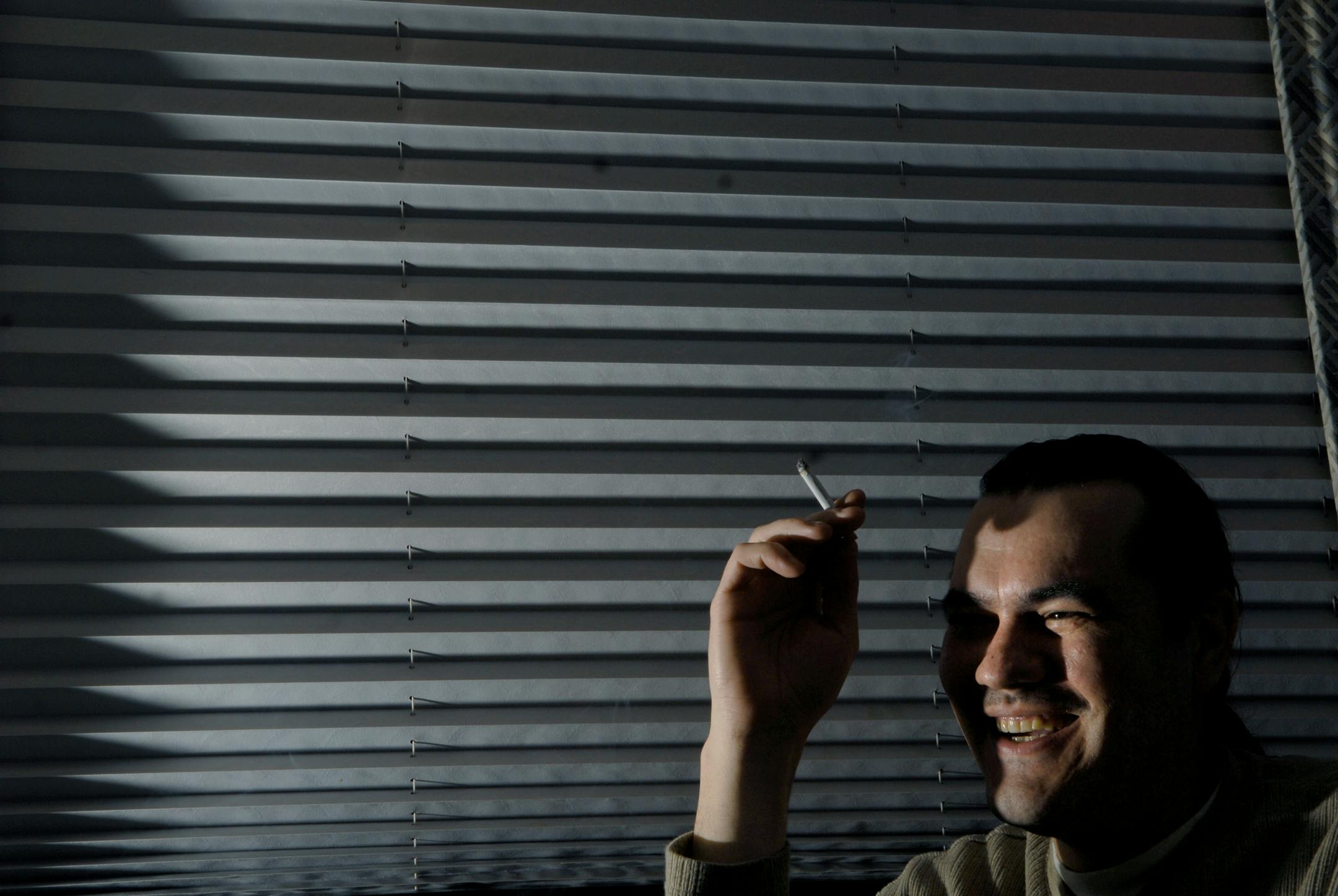 Atmosphere member Anthony Davis "Ant" smiles Monday before the midnight release of their record.