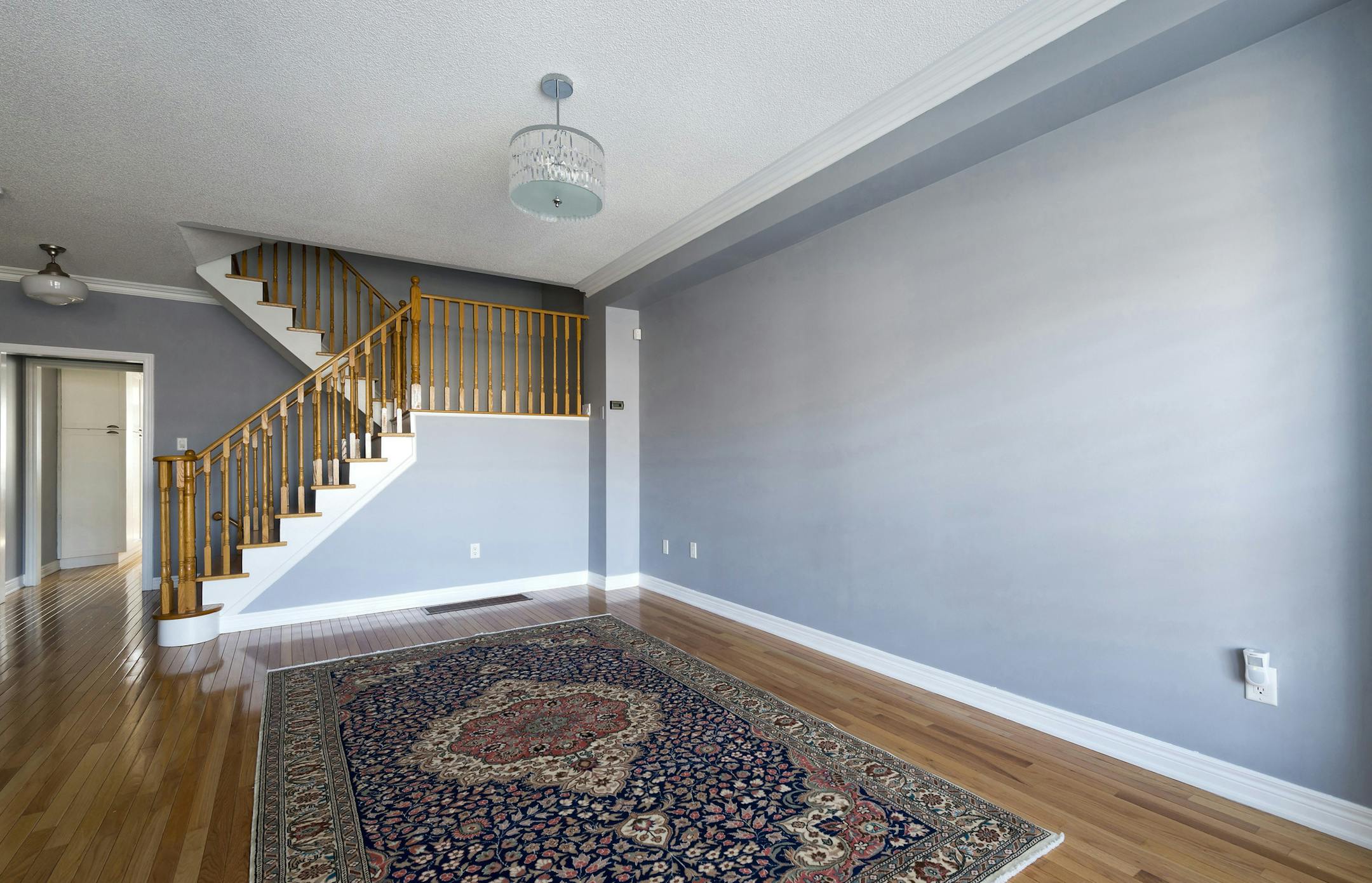 Before: Mary Grace and Manesh moved from a condo into a house and, as you might expect, they didn't have enough furniture to go around. Their living room was bare, and had stayed that way all this time, because the two of them had very different visions of how they'd like to finish it off. (Vincenzo Pistritto/MCT)