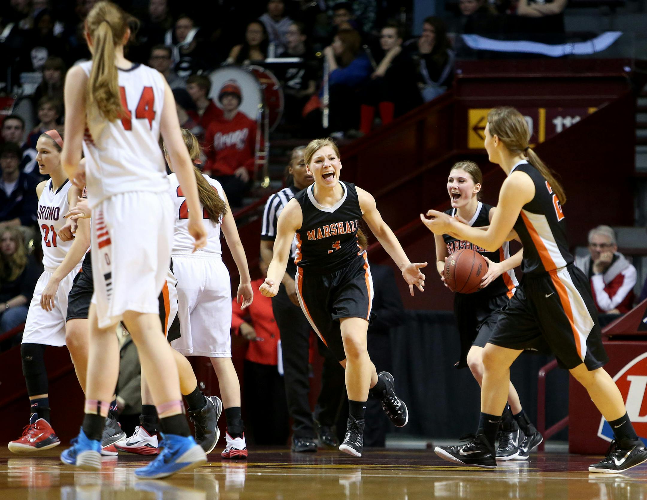 Marshall's Sarah Buysse (3) celebrates at the buzzer with teammates against Orono during the Class 3A girls basketball semifinals at Williams Arena Thursday, March 19, 2015, in Minneapolis, MN. Marshall beat Orono 55-48.](DAVID JOLES/STARTRIBINE)djoles@startribune.com Class 3A girls basketball semifinals at Williams Arena Thursday, March 19, 2015, in Minneapolis, MN.