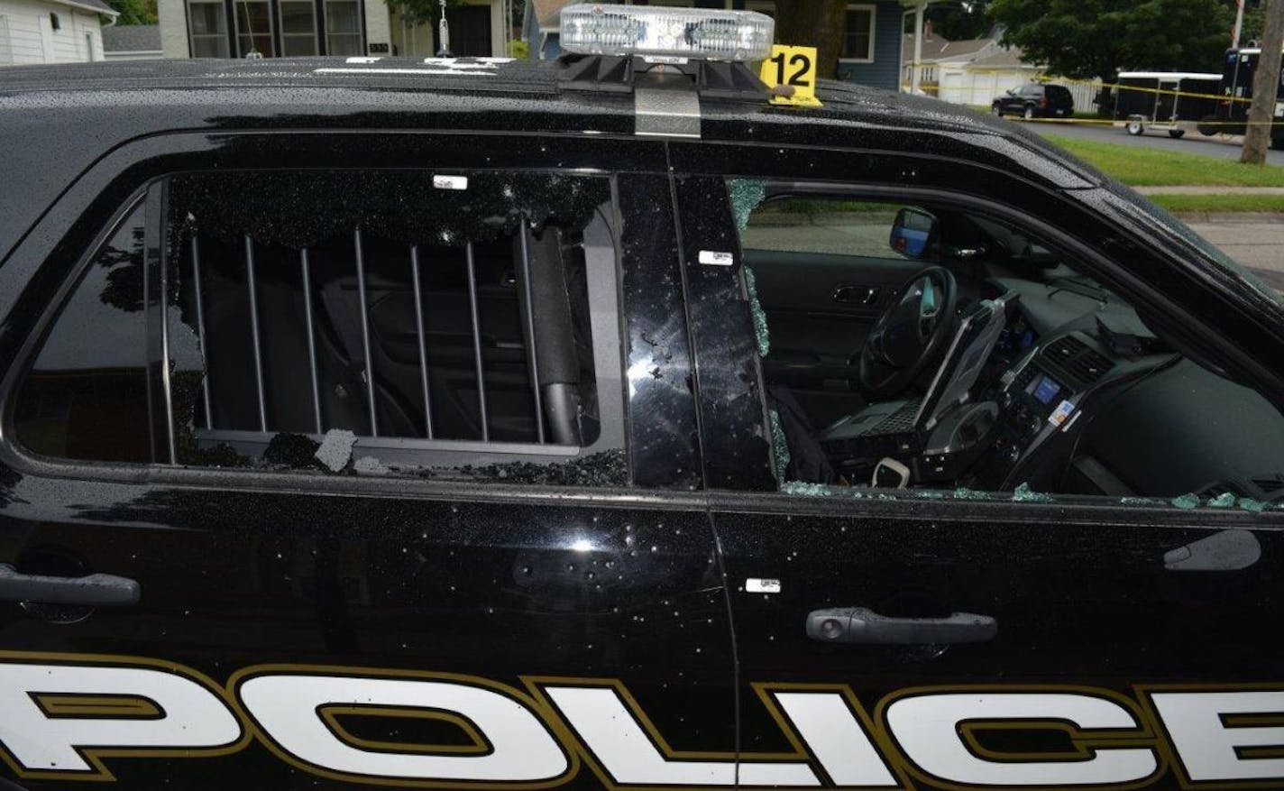 Gunfire severely damaged this South St. Paul squad car in July 2018. Credit: South St. Paul Police Department