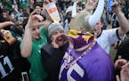 Vikings fan Andrew Grein of Edina, walked through a crowd of hostile Eagle fans before kickoff of the NFC Championship game at Lincoln Financial Field