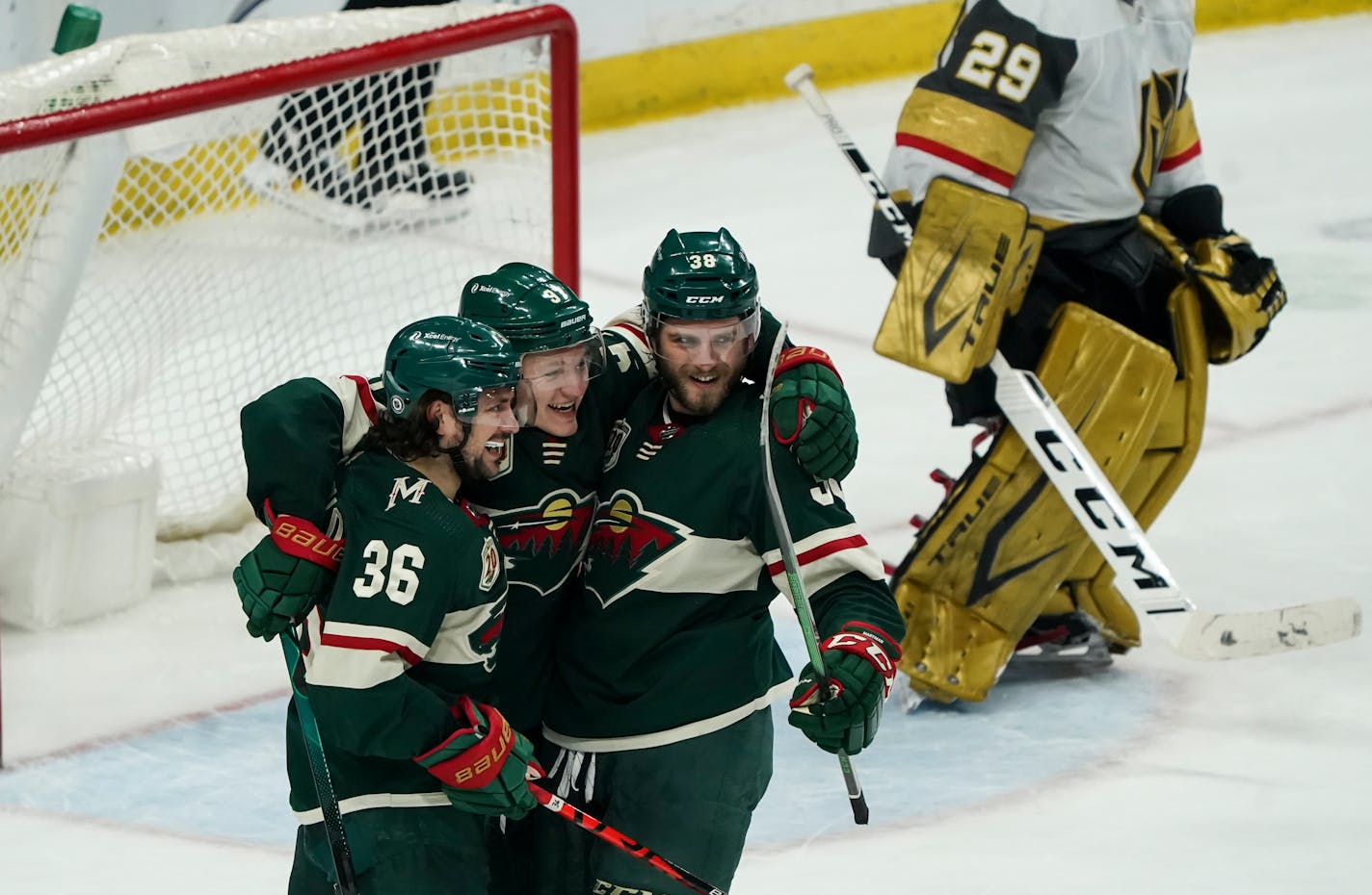 Minnesota Wild right wing Mats Zuccarello (36) and Minnesota Wild right wing Ryan Hartman (38) celebrated with Minnesota Wild left wing Kirill Kaprizov (97) after he scored a second point in the third period. ] RENEE JONES SCHNEIDER ¥ Renee.jones@startribune.com