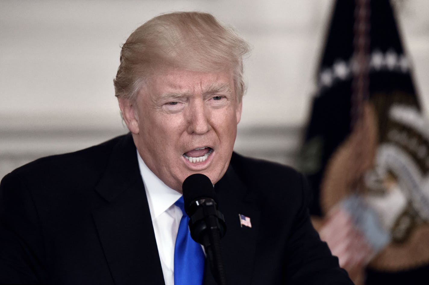 President Donald Trump makes a statement on the Wednesday-morning shooting of Republican lawmaker Steve Scalise at a baseball field in Alexandria, Virginia, in the Diplomatic Room of the White House, on June 14, 2017. (Olivier Douliery/Abaca Press/TNS)