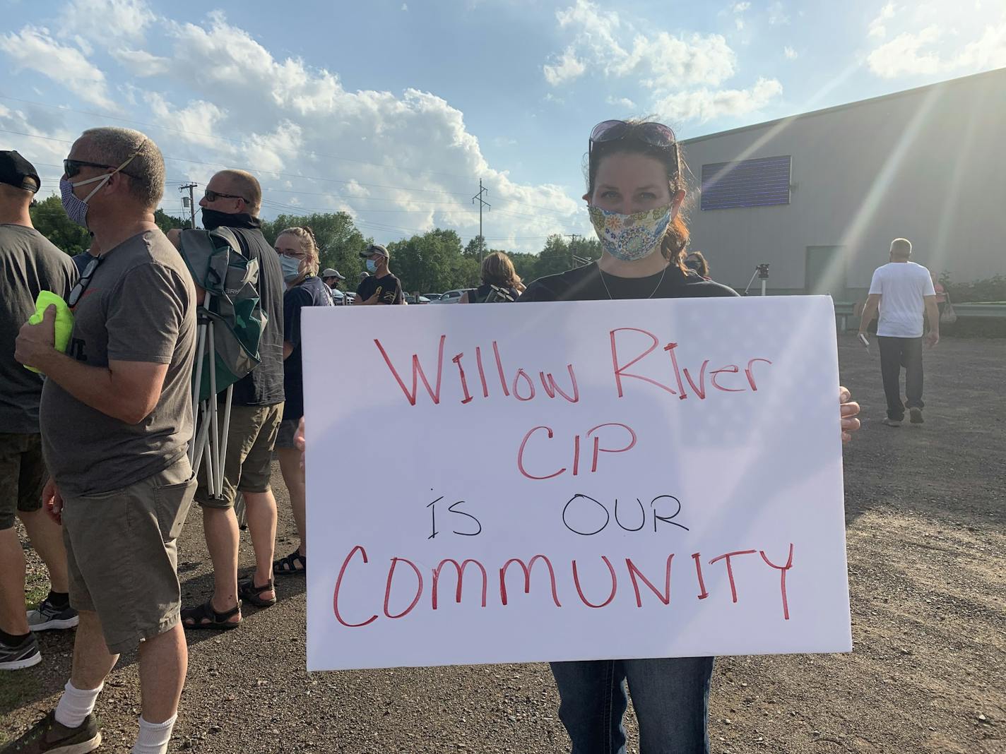 A Corrections employee and Moose Lake local holds a sign in support of the Challenge Incarceration Program (CIP), a military-style boot camp in neighboring Willow River for nonviolent inmates.