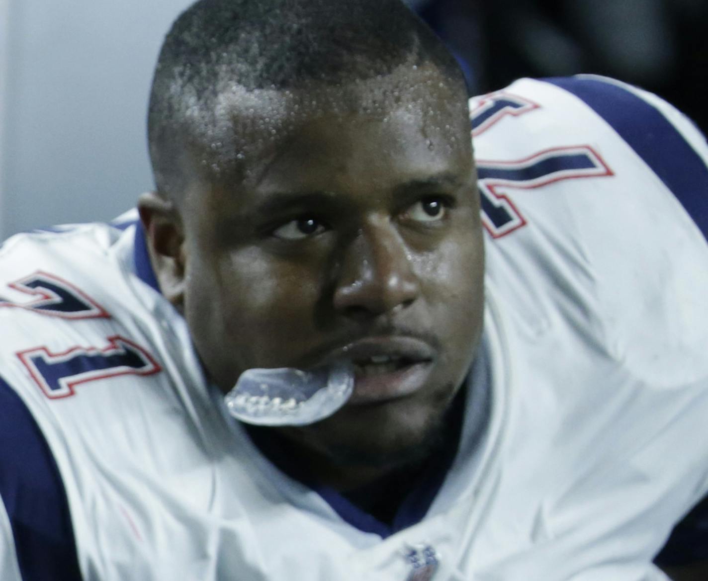 New England Patriots offensive guard Shaq Mason (69) and offensive tackle Cameron Fleming (71) watch the game from the sidelines, during the first half of an NFL football game against the Miami Dolphins, Monday, Dec. 11, 2017, in Miami Gardens, Fla. (AP Photo/Lynne Sladky) ORG XMIT: OTK