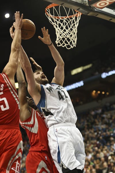 Timberwolves forward Kevin Love went up for a shot during the first half against Houston on Monday.