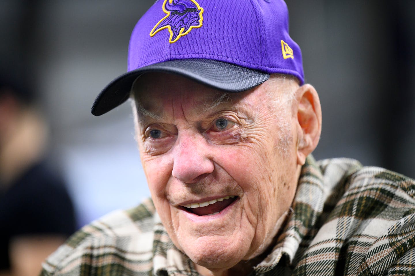 Former Vikings Head Coach Bud Grants laughs as he speaks with Star Tribune columnist Patrick Reusse after a press conference introducing new head coach Kevin O'Connell Thursday, Feb. 17, 2022 at the TCO Performance Center in Eagan, Minn. ] AARON LAVINSKY • aaron.lavinsky@startribune.com ORG XMIT: MIN2202172103460140