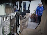 Norma Leary is a regular client who appreciates the HEPA filter and divider in her Edwards RideCare car on Monday, Oct. 23, 2023.