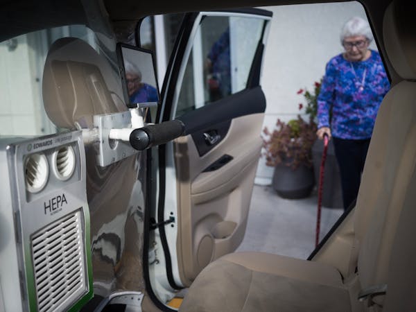Norma Leary is a regular client who appreciates the HEPA filter and divider in her Edwards RideCare car on Monday, Oct. 23, 2023.