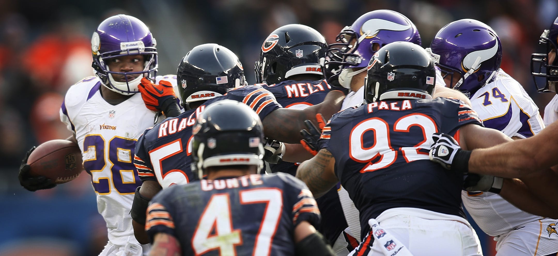 Vikings running back Adrian Peterson, in what was a typical scene Sunday at Soldier Field, drew a four-deep crowd of Bears defenders as he prepared to cut to his right on a carry in the third quarter. Peterson caused a stir when he arrived late to the stadium but topped 100 yards rushing for the fifth consecutive game.