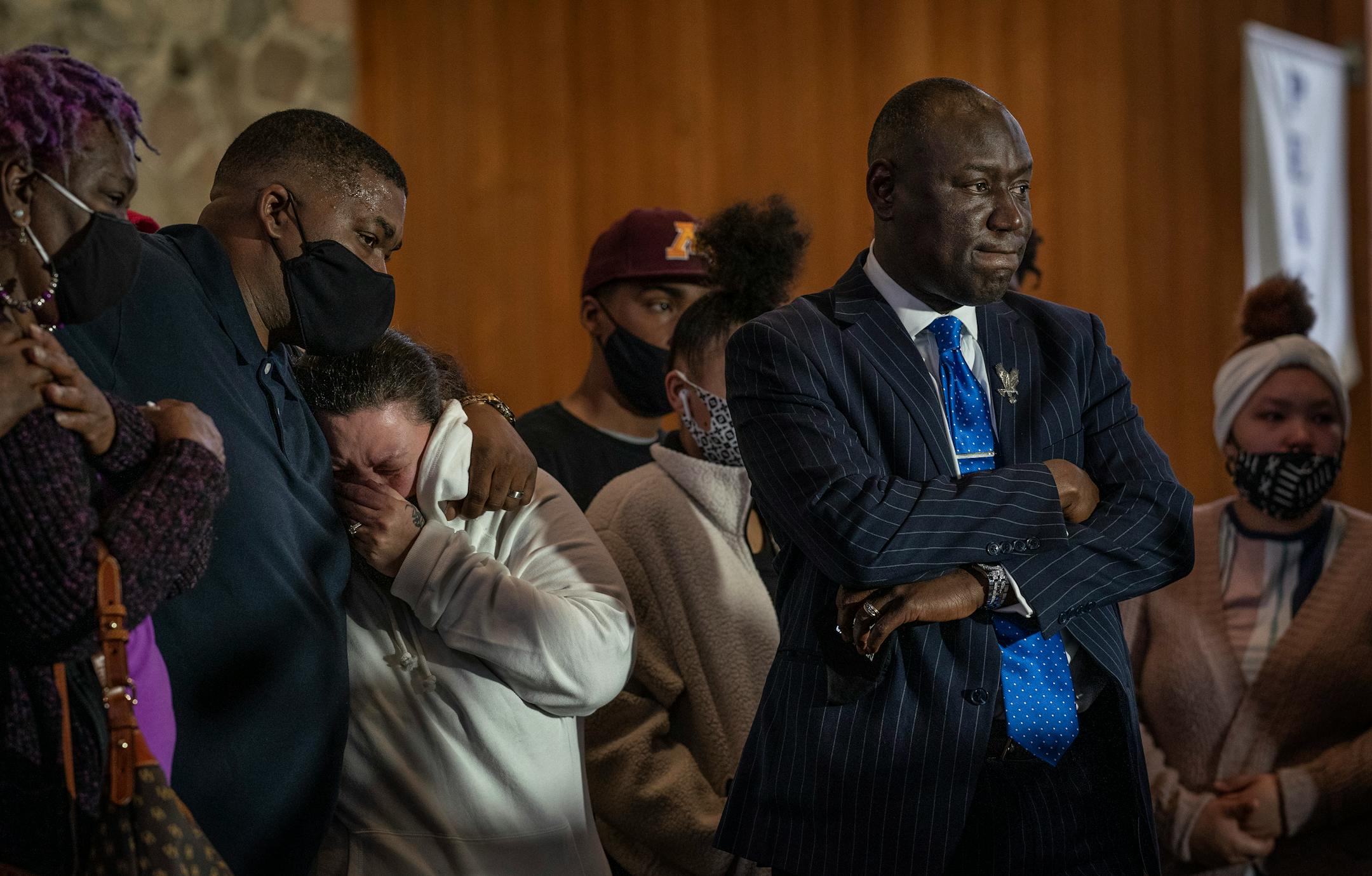 Aubrey Wright, left, consoled Katie Wright as attorney Ben Crump gathered the family for a press conference at New Salem Missionary Baptist Church in Minneapolis.