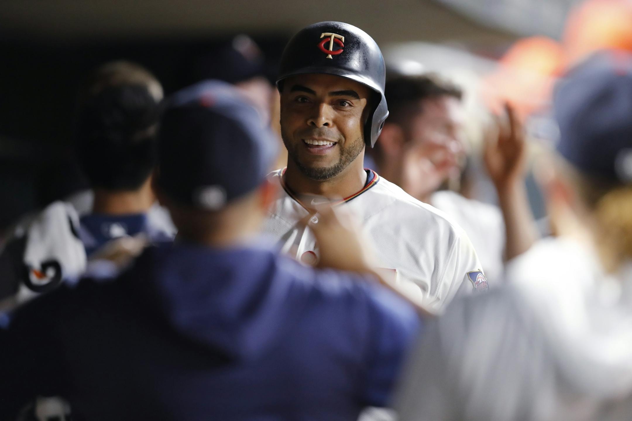Minnesota Twins designated hitter Nelson Cruz (23) celebrates a home run in the seventh inning.